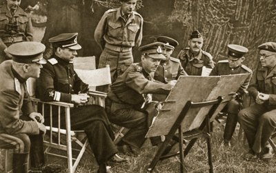 Lieutenant General Dempsey, Commander of the British Second Army, explains to Soviet officers the state of affairs on the Western Front, 1944 by English Photographer